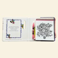 Coloring book with a page of black and white floral design and a pink pen.