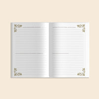 Open journal of Uncle's Story with lined pages of prompts about your early childhood with decorative leaves on a beige background