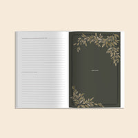 Open journal of Uncle's Story with decorative leaf patterns on a beige background