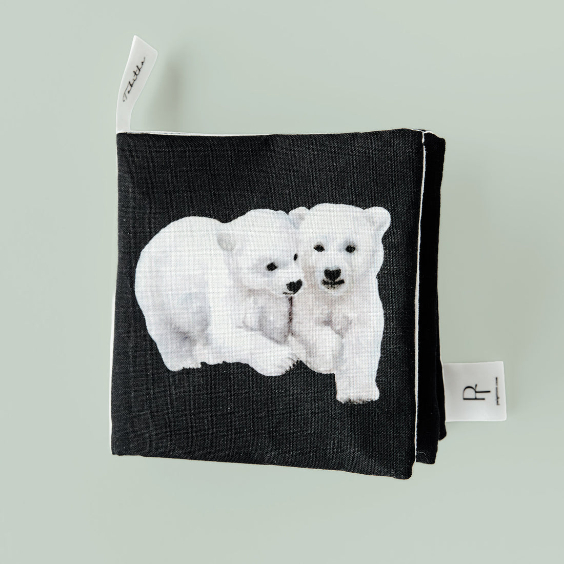 Black pouch with white polar bear design on a light gray background