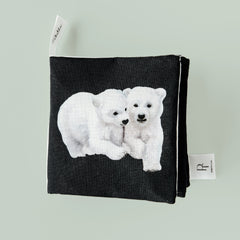 Black pouch with white polar bear design on a light gray background