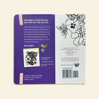 Reusable water reveal pad packaging with floral illustrations and text on a beige background