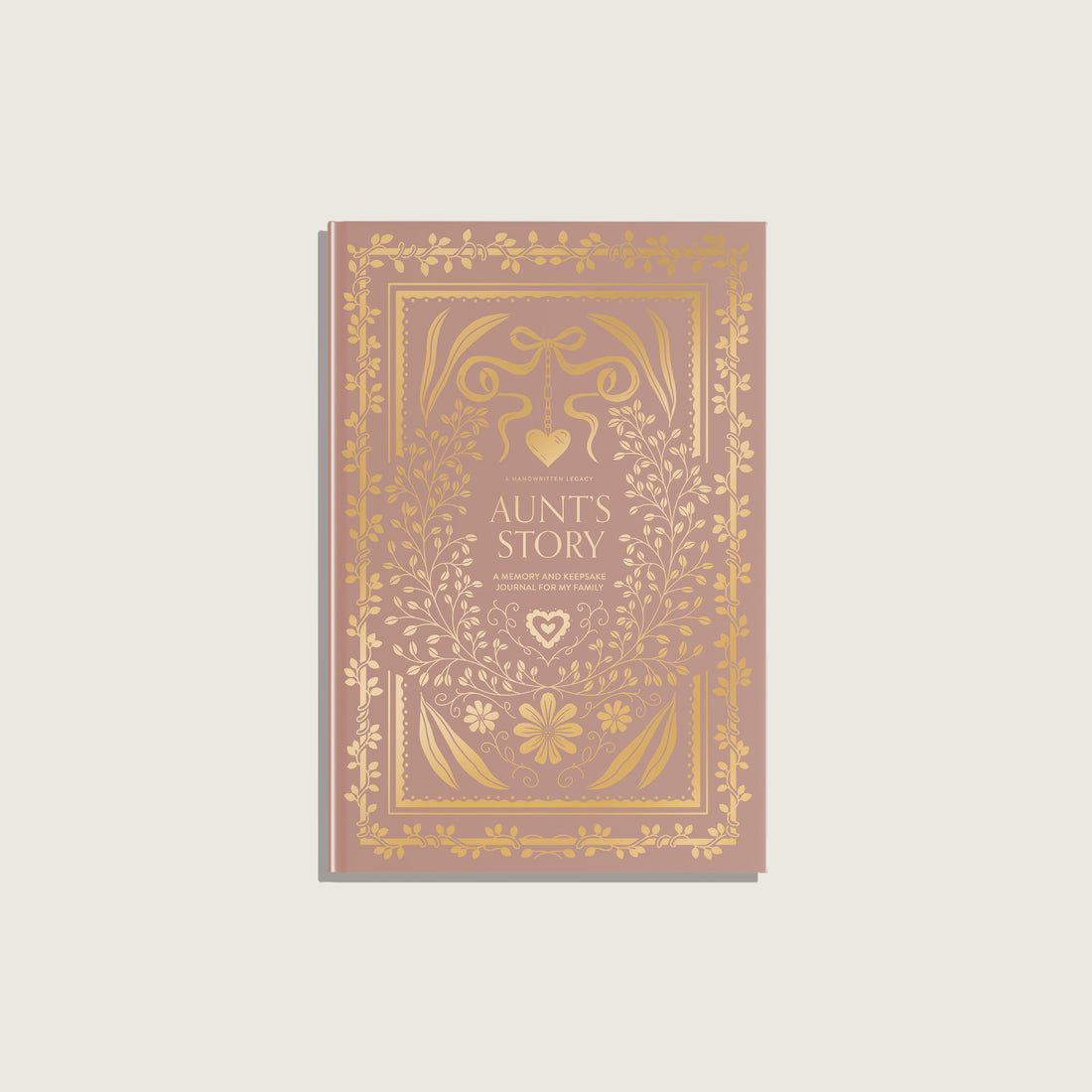 Book titled 'Aunt's Story' with decorative gold design on a light gray background