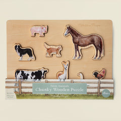 Farm animals chunky wooden puzzle on a beige background