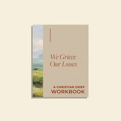 We Grieve Our Losses has a light beige background with a mountain seen to the left. Extra test reads: A Christian Grief Workbook 