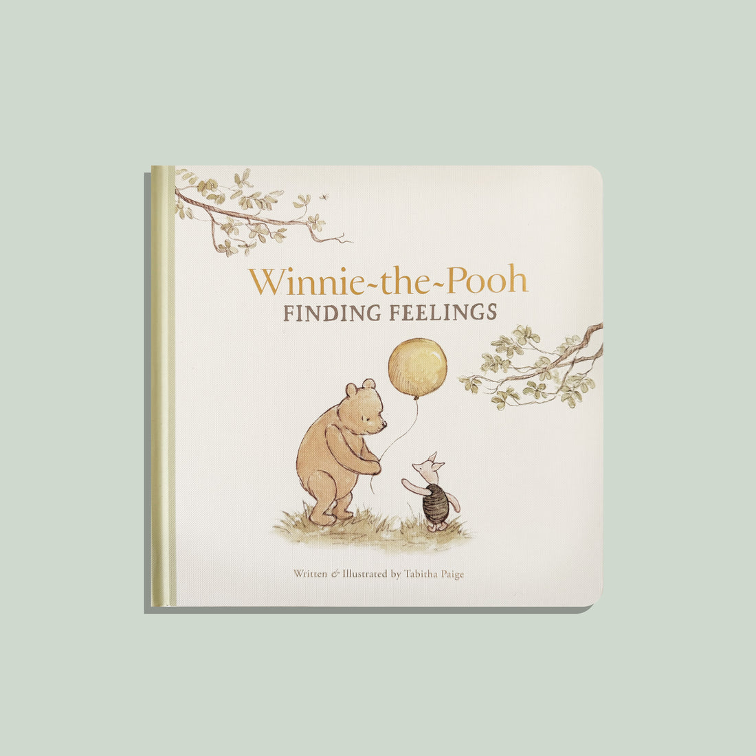 Book titled 'Winnie-the-Pooh Finding Feelings' with illustrations of Pooh and Piglet on a light green background