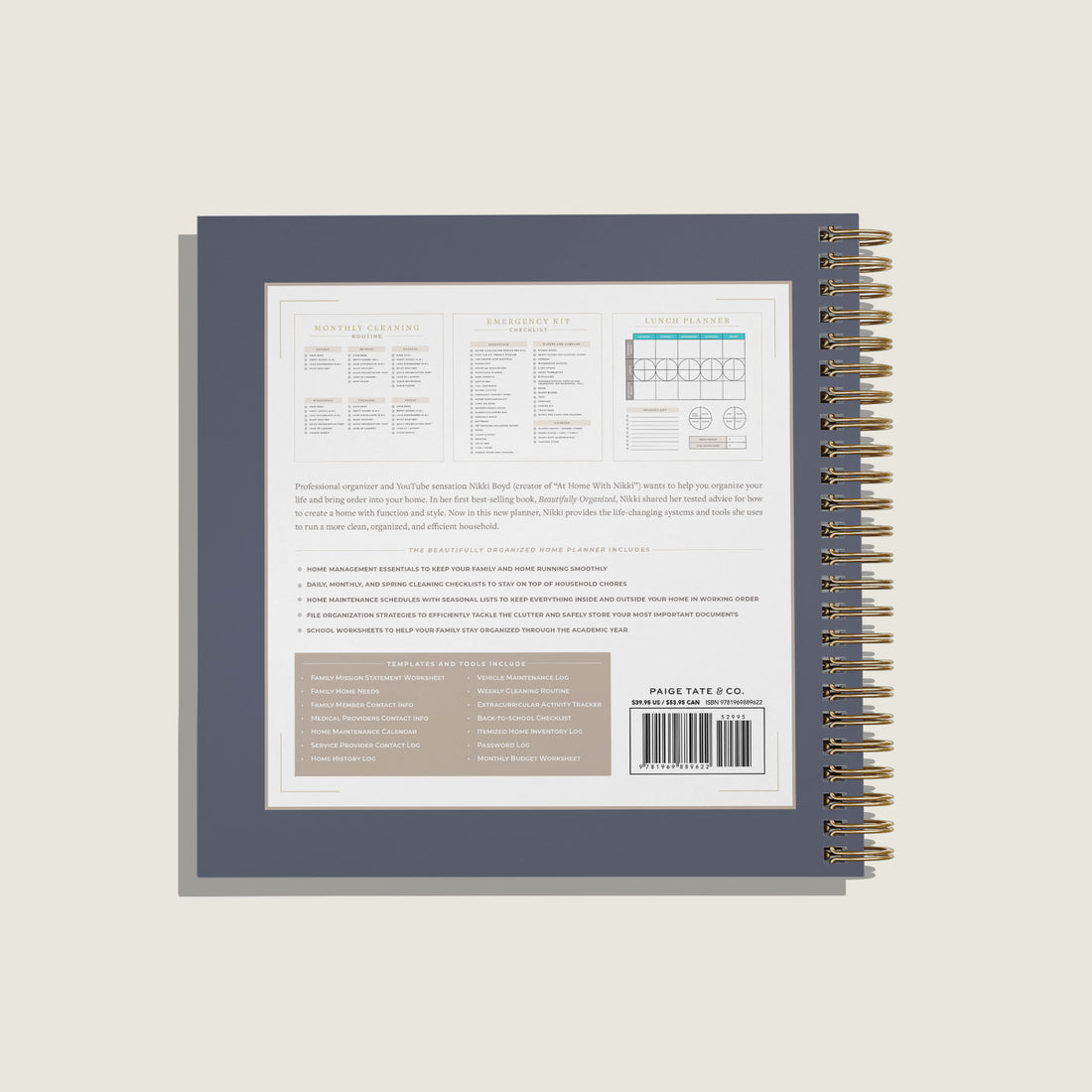 Back cover of a spiral-bound notebook or planner in a dark slate blue-gray color, showing printed text, a barcode, and a page count on a light beige background.