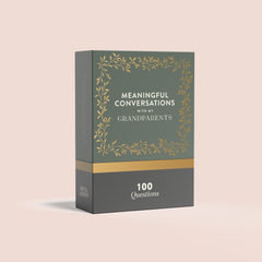 A box of 'Meaningful Conversations with Grandparents' conversation cards featuring gold foil and hand-drawn illustrations.