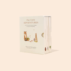 A boxed set of children's books titled 'Our Little Adventures' with illustrations of animals on the cover.
